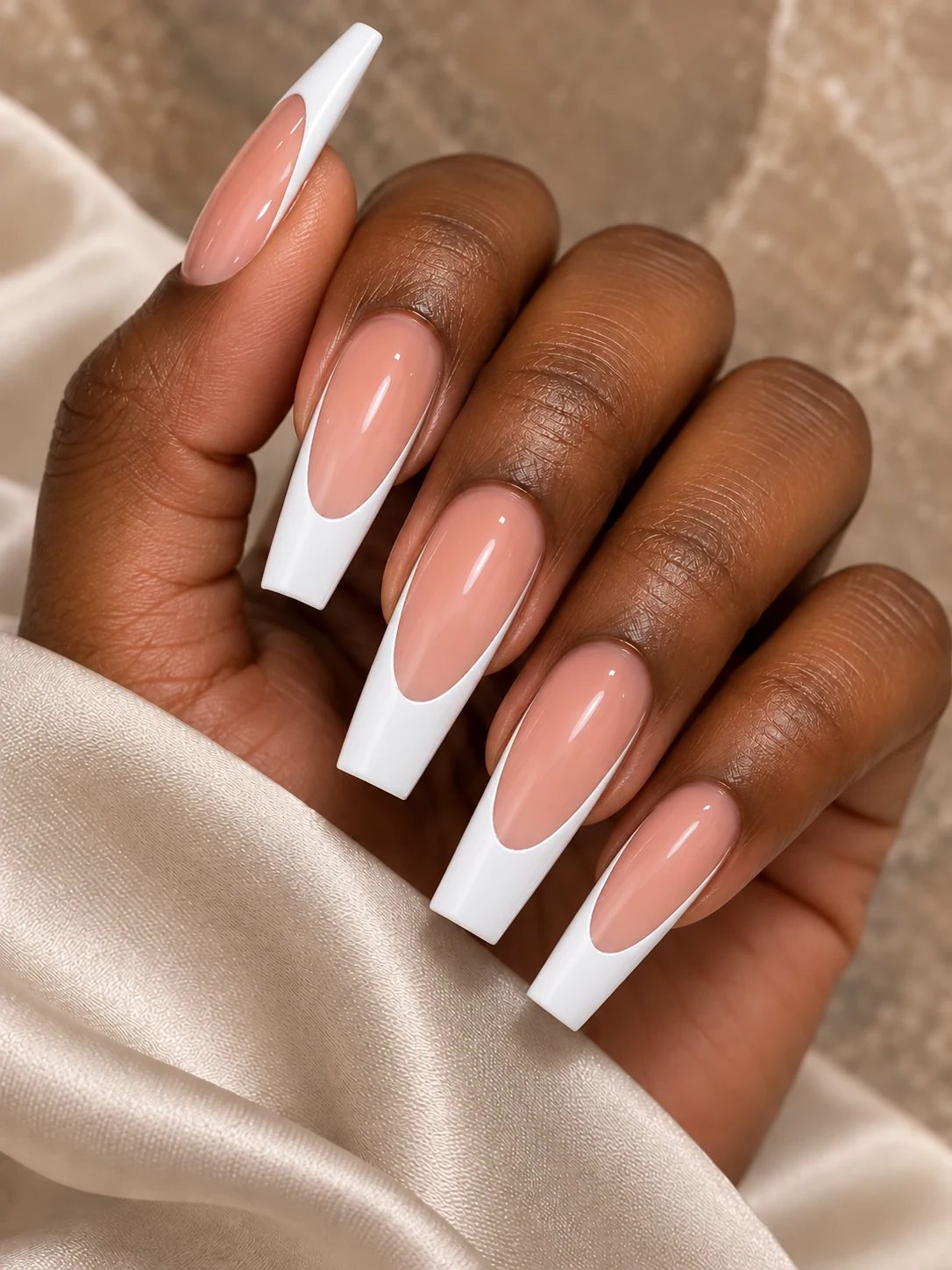 Dramatic Deep: long coffin nails with glossy white French tips and nude-pink centers